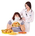 Woman with hamburger and doctor. Royalty Free Stock Photo