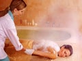 Woman in hammam or turkish bath Royalty Free Stock Photo