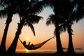 Woman in hammock on the beach Royalty Free Stock Photo