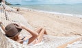 Woman on hammock. Lifestyle concept. Summer vacation. Nature concept. Summer tourism, travel.