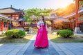 Woman with Hanbok in Gyeongbokgung,the traditional Korean dress. Royalty Free Stock Photo