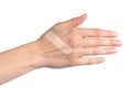 Woman hand with a band aid Royalty Free Stock Photo