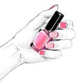 Woman hand with a beautiful french manicure holding nail polish. Royalty Free Stock Photo