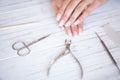 Woman Hand Care. Closeup Of Beautiful Female Hands Having Spa Manicure At Beauty Salon. Beautician Filing Clients Royalty Free Stock Photo