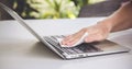 Woman Hand Cleaning Laptop  At Home Royalty Free Stock Photo