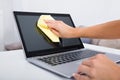 Woman Hand Cleaning Laptop Screen Royalty Free Stock Photo