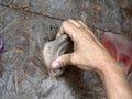 Woman hand on Climbing training wall close up Royalty Free Stock Photo