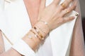 Woman hand closeup with jewellery rings and bracelets fashion style Royalty Free Stock Photo