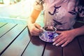 Woman hand coffee sitting in cafe Royalty Free Stock Photo