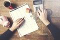 Woman hand coins and calculator with piggy bank