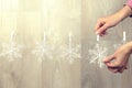 Woman hand creating christmas decoration indoor