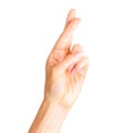 Woman hand with crossed fingers, gesture of good luck symbol