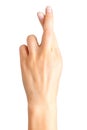 Woman hand with crossed fingers, gesture of good luck symbol