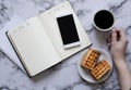 Woman hand, cup of coffee, planning day, buisness lunch and smartphone