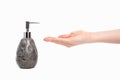 Woman hand dispensing hand sanitizer - swine flu prevention theme - on a white background with copy space Royalty Free Stock Photo