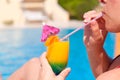 Woman hand drinking cocktail Royalty Free Stock Photo