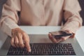 Woman hand enter a one time password for the validation process on laptop, Mobile OTP secure Verification Method, 2-Step Royalty Free Stock Photo