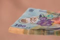 Woman hand giving money like bribe or tips isolated . LEI currency banknotes close up. Reward for hard work, finance and business Royalty Free Stock Photo
