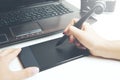 Woman hand on graphic tablet