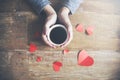 Woman hand hearts and coffee on table background