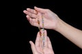 Woman hand hold jewelry bracelet Royalty Free Stock Photo