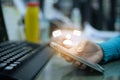 Woman hand hold mobile phone with email and human icon