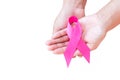 Woman hand hold pink ribbon on white background ,Awareness breast cancer concept Royalty Free Stock Photo