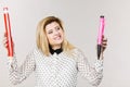 Woman holding big pencil and pen Royalty Free Stock Photo