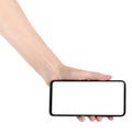 Woman hand holding the black new smartphone with blank screen isolated white background. hands using phone clipping path Royalty Free Stock Photo