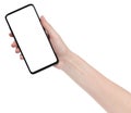 Woman hand holding the black new smartphone with blank screen isolated white background. hands using phone clipping path Royalty Free Stock Photo