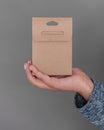 Woman holding blank carton box. Mockup for design Royalty Free Stock Photo