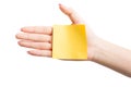 Woman hand holding blank yellow notepaper Royalty Free Stock Photo