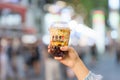 woman hand holding brown sugar boba milk tea with tapioca pearls, Xing Fu Tang brand known for making the best hand crafted brown Royalty Free Stock Photo