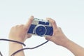 Woman hand holding camera for selfie Royalty Free Stock Photo