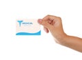 Woman hand holding card on white background. Medical service concept Royalty Free Stock Photo