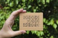 Woman hand holding cardboard card with phrase Words Have Power