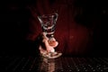 Woman hand holding a cocktail glass filled with a fresh drink Royalty Free Stock Photo