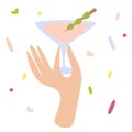 Woman hand holding a cocktail glass with martini or alcohol drink with olive. Happy hour, cheers sign, party design, celebration Royalty Free Stock Photo
