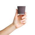 Woman hand holding coffee paper drinking cup Royalty Free Stock Photo