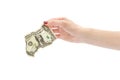 Woman hand holding crumpled one dollar bill. Isolated on white Royalty Free Stock Photo