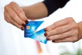 Woman hand holding cut credit card Royalty Free Stock Photo