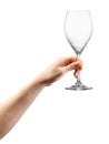 Woman hand holding empty wine glass isolated on white Royalty Free Stock Photo