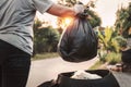 woman hand holding garbage bag for recycle cleaning