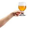 Woman hand holding glass of lager beer isolated on white Royalty Free Stock Photo