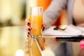 Woman hand holding glass of orange juice Royalty Free Stock Photo