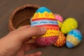 Woman hand holding a hand painted Easter egg Royalty Free Stock Photo