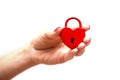 Woman hand holding heart shaped lock Royalty Free Stock Photo