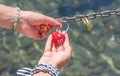 Woman hand holding heart shaped padlock Royalty Free Stock Photo