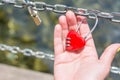 Woman hand holding heart shaped padlock Royalty Free Stock Photo