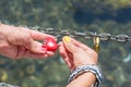 Woman hand holding heart shaped padlock Royalty Free Stock Photo